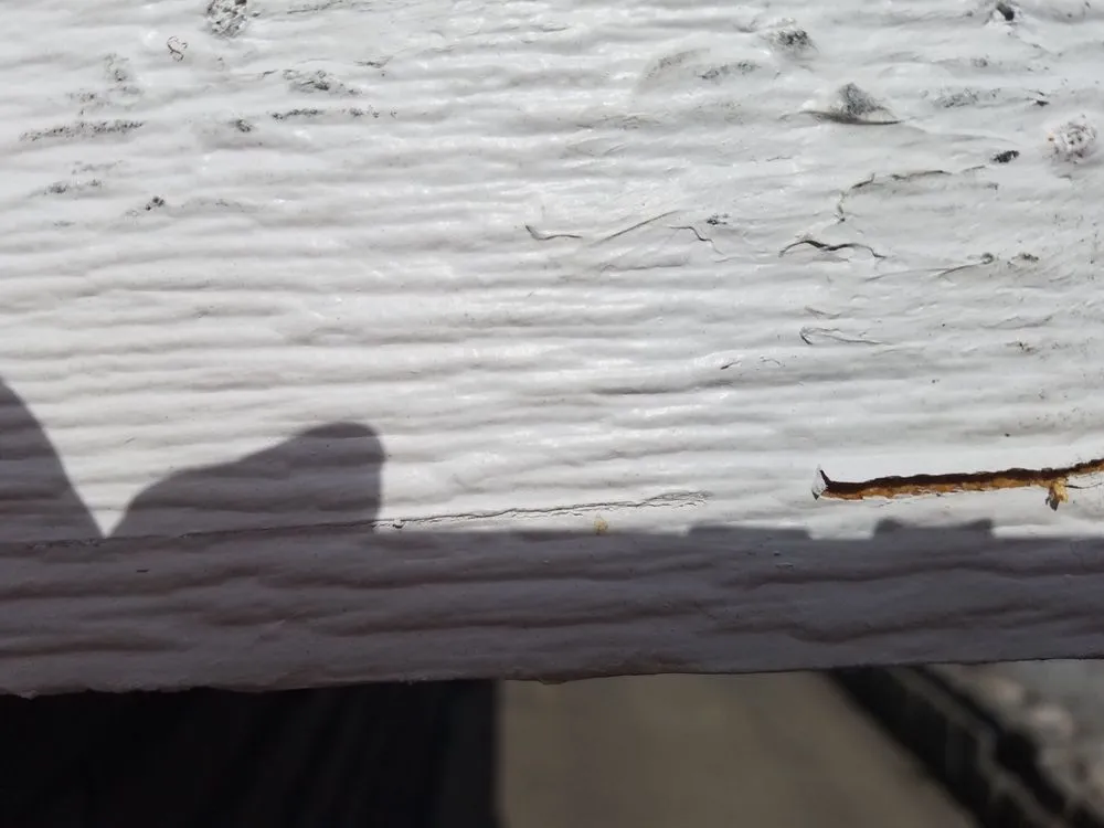 Slide of Palmer Roofing