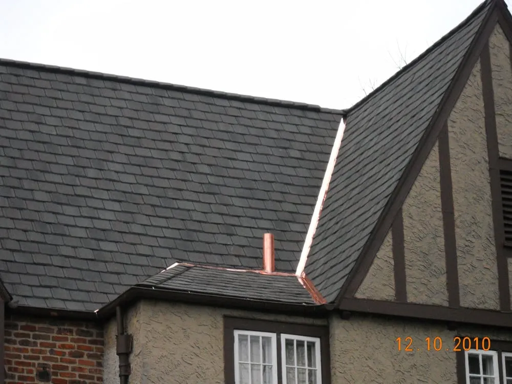 Slide of Papa & Sons Roofing