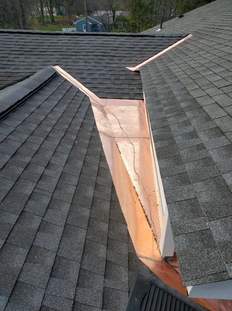 Slide of Papa & Sons Roofing