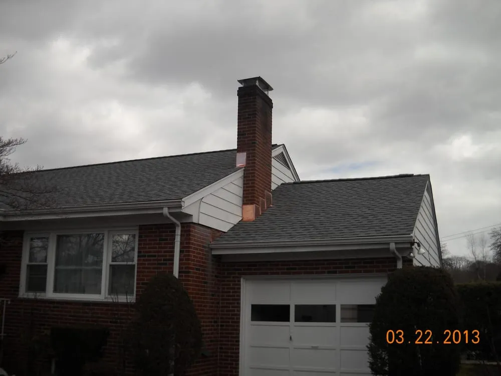 Slide of Papa & Sons Roofing