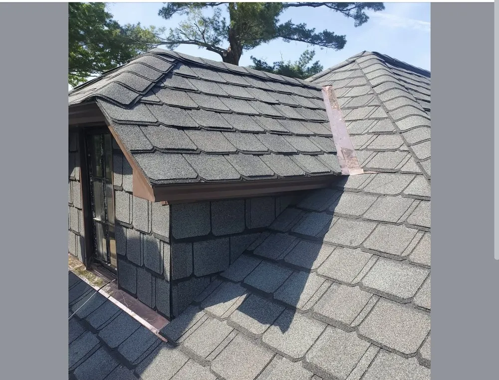 Slide of Papa & Sons Roofing