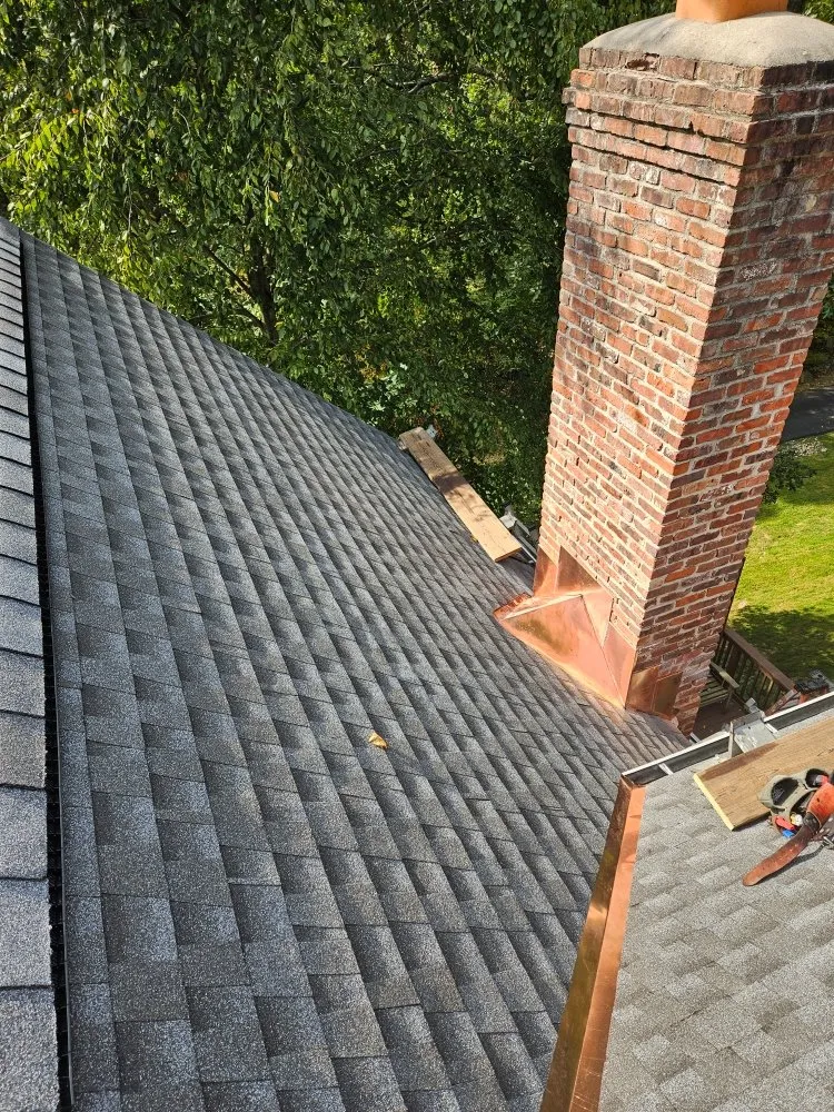 Slide of Papa & Sons Roofing