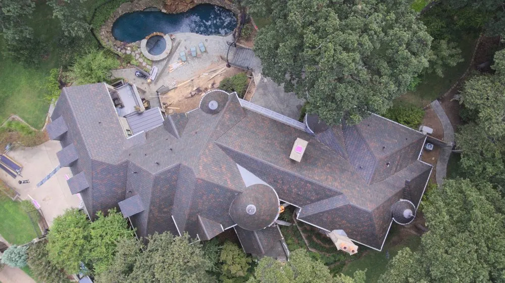 Slide of Paradigm Roofing