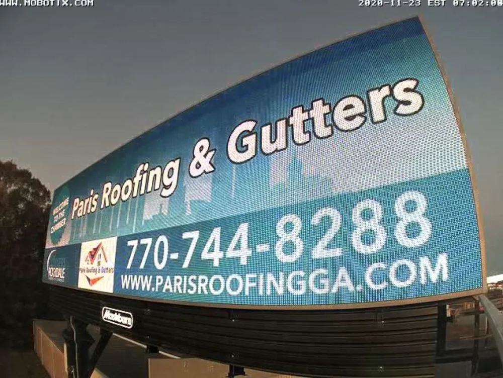 Slide of Paris Roofing & Gutters