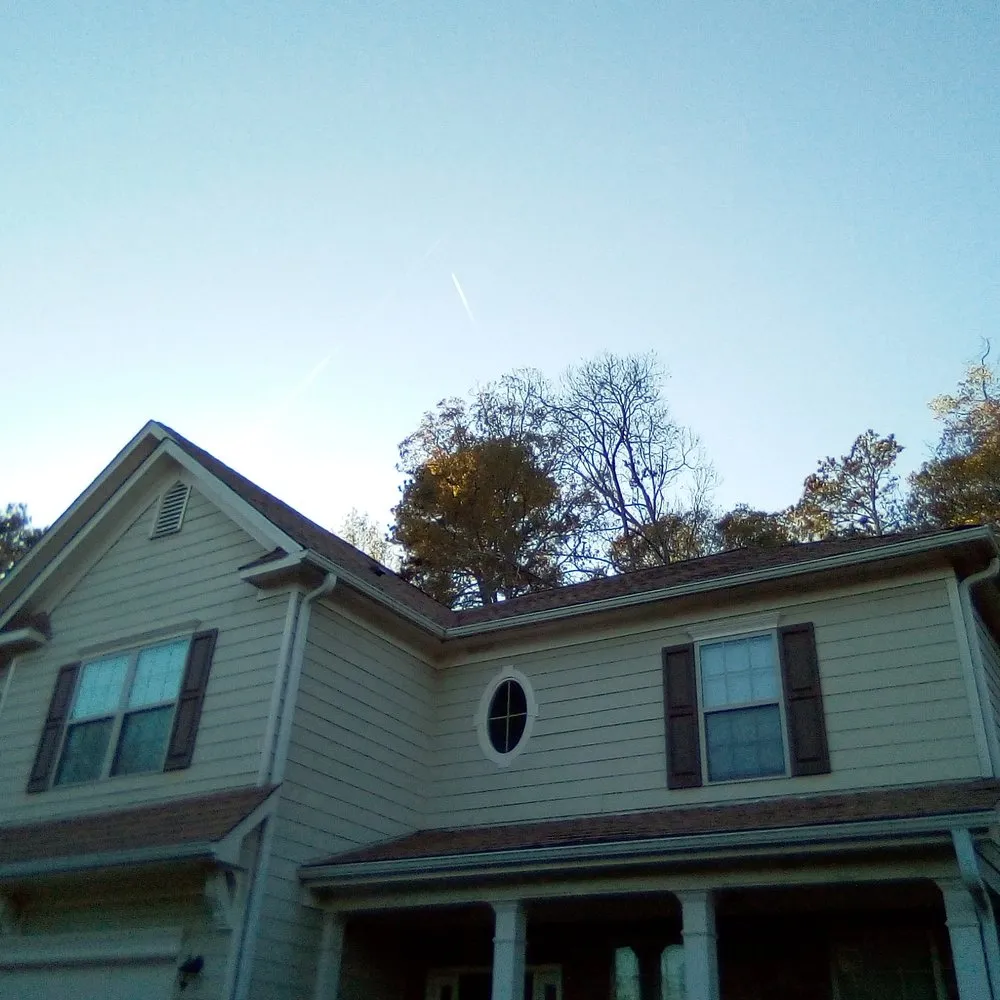 Slide of Paris Roofing & Gutters