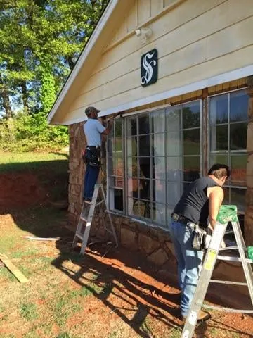 Slide of Parker Brothers Roofing