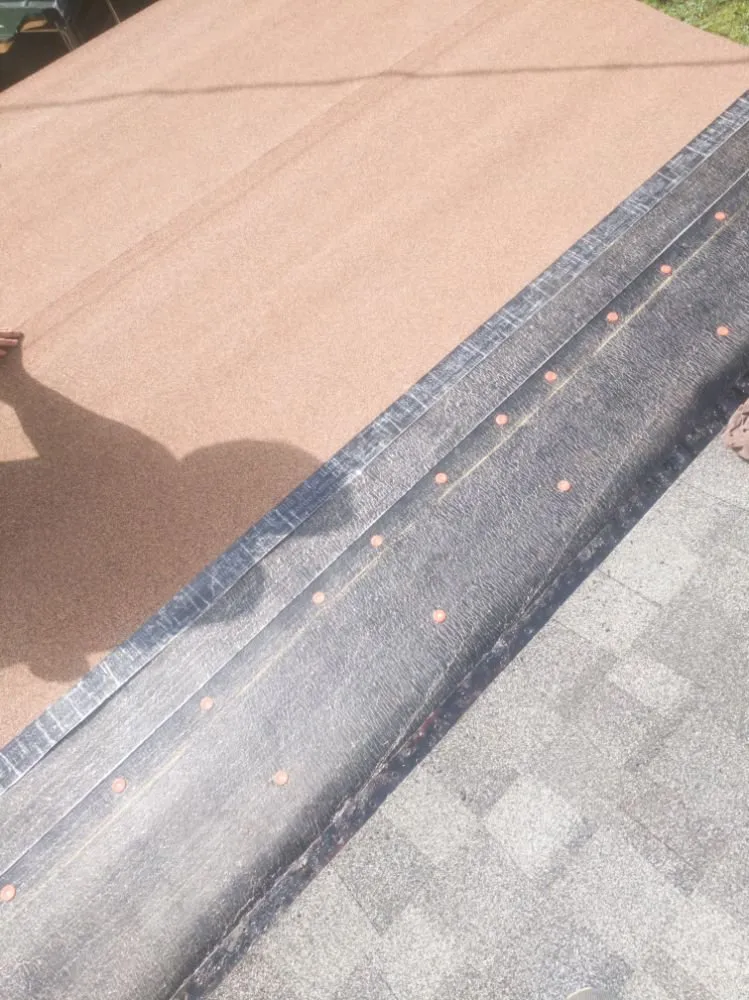 Licensed roof repair after storm damage in Gulf Port, FL by Parrish and Sons Roofing