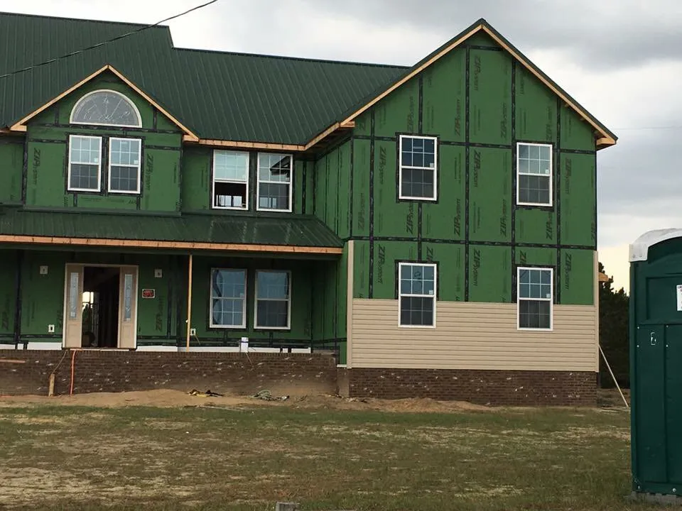 Slide of Patch Adams Roofing