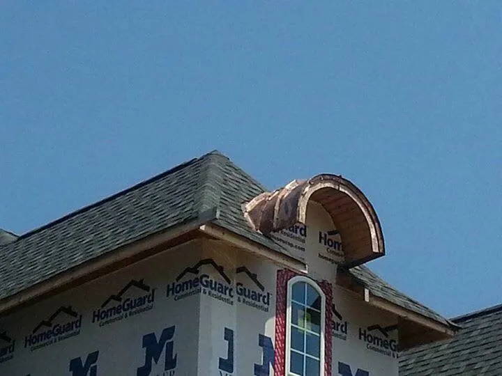 Slide of Patch Adams Roofing