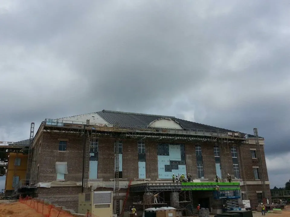 Slide of Patch Adams Roofing