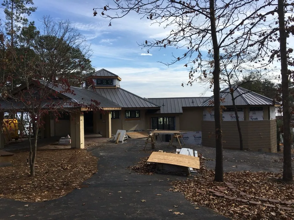 Slide of Patch Adams Roofing