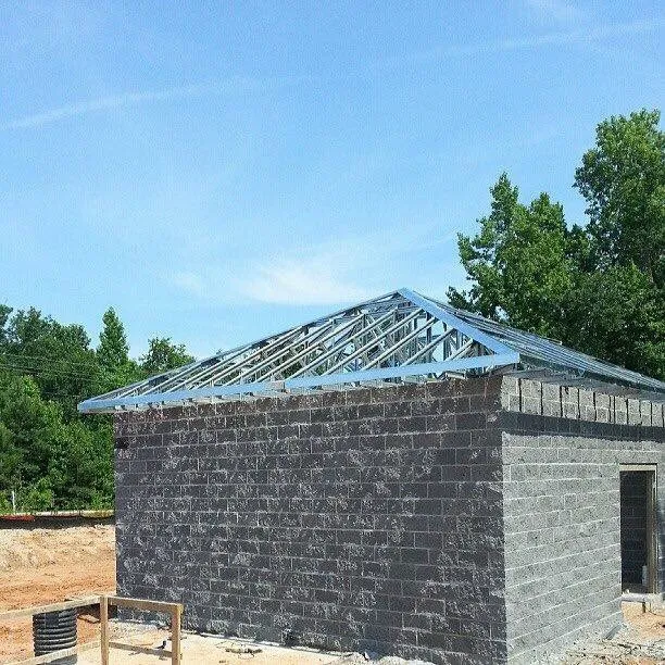 Slide of Patch Adams Roofing