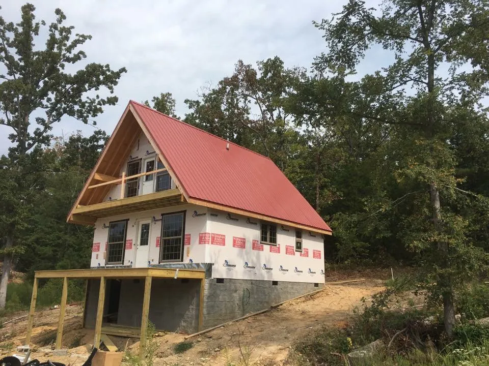 Slide of Patch Adams Roofing