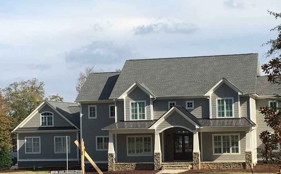 Slide of Patch Adams Roofing