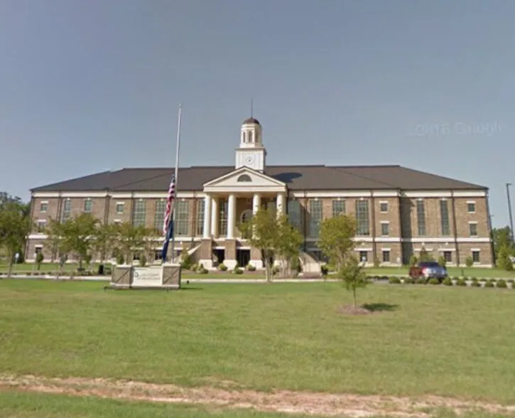 Slide of Patch Adams Roofing