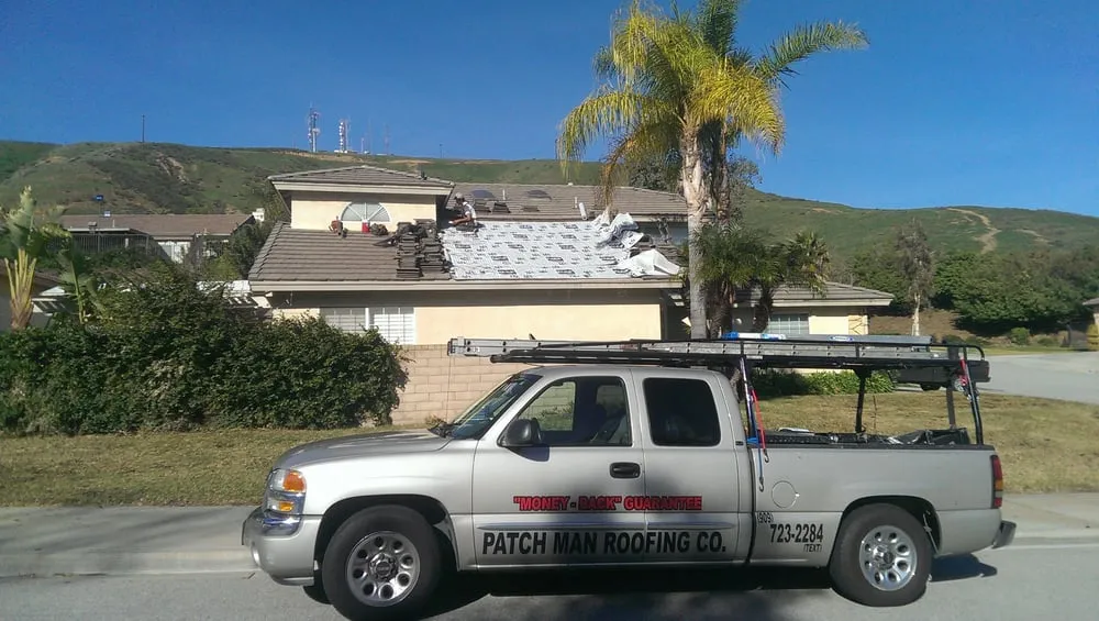 Slide of Patchman Roofing