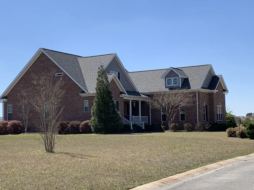 Slide of Patriot Roofing Company