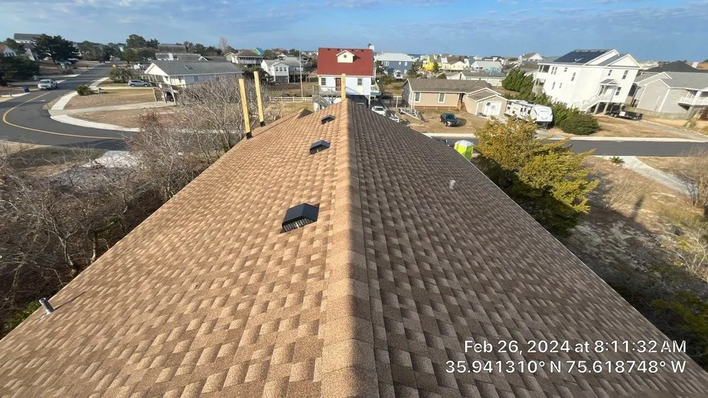 Slide of Patriots' Roofing