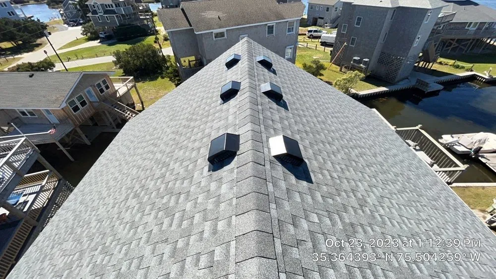 Slide of Patriots' Roofing