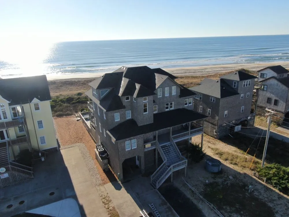 Slide of Patriots' Roofing