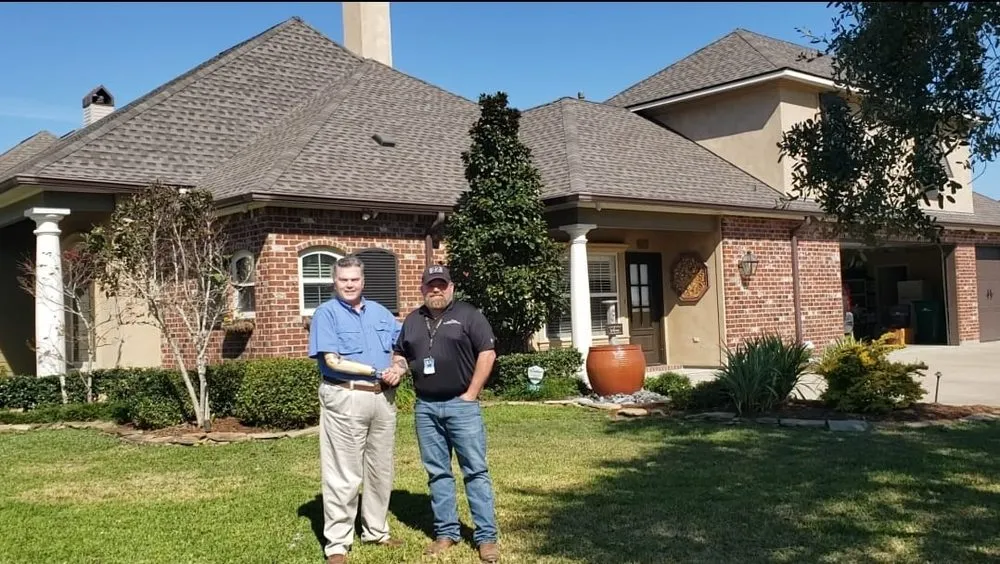 Slide of Patriots' Roofing
