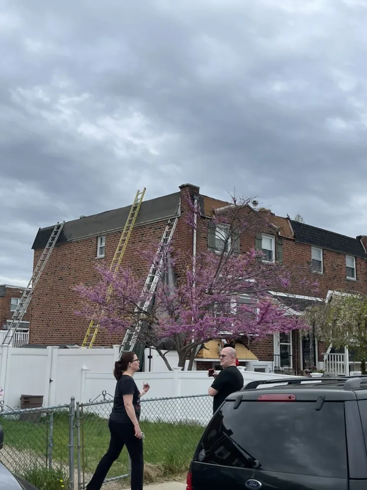 Slide of Pat's Roofing Solutions