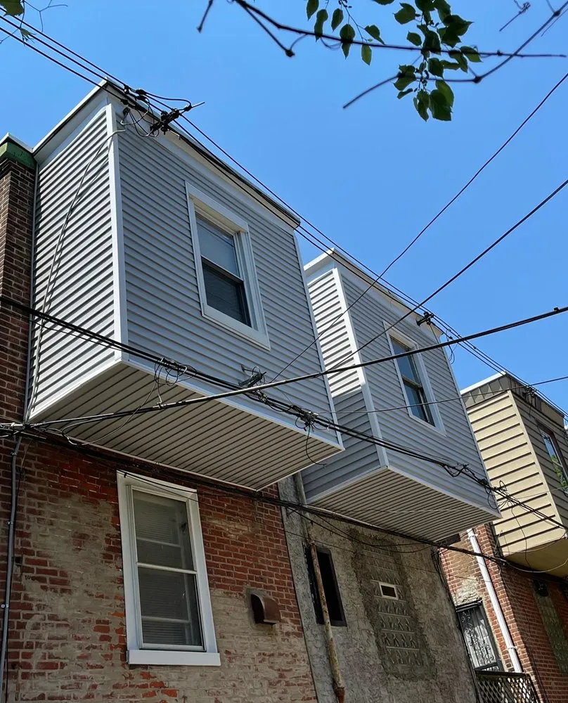 Slide of Pat's Roofing Solutions