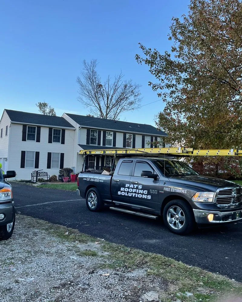 Slide of Pat's Roofing Solutions