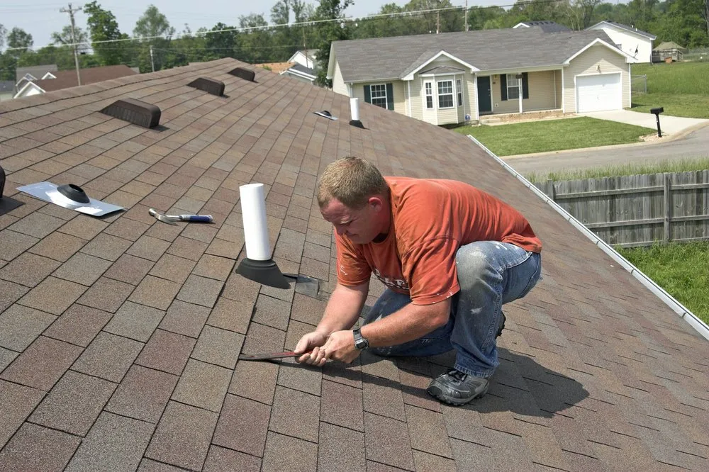 Reliable shingle roofing service after storm damage in Pomfret, MD by Paul Tackish Construction And Roofing