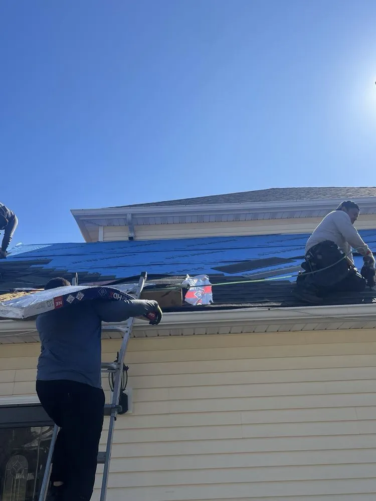 Slide of Payless Roofing and Gutters