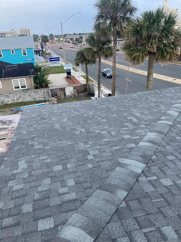 Slide of Payless Roofing