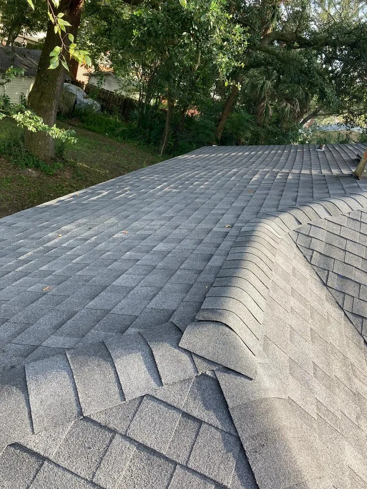 Slide of Payless Roofing