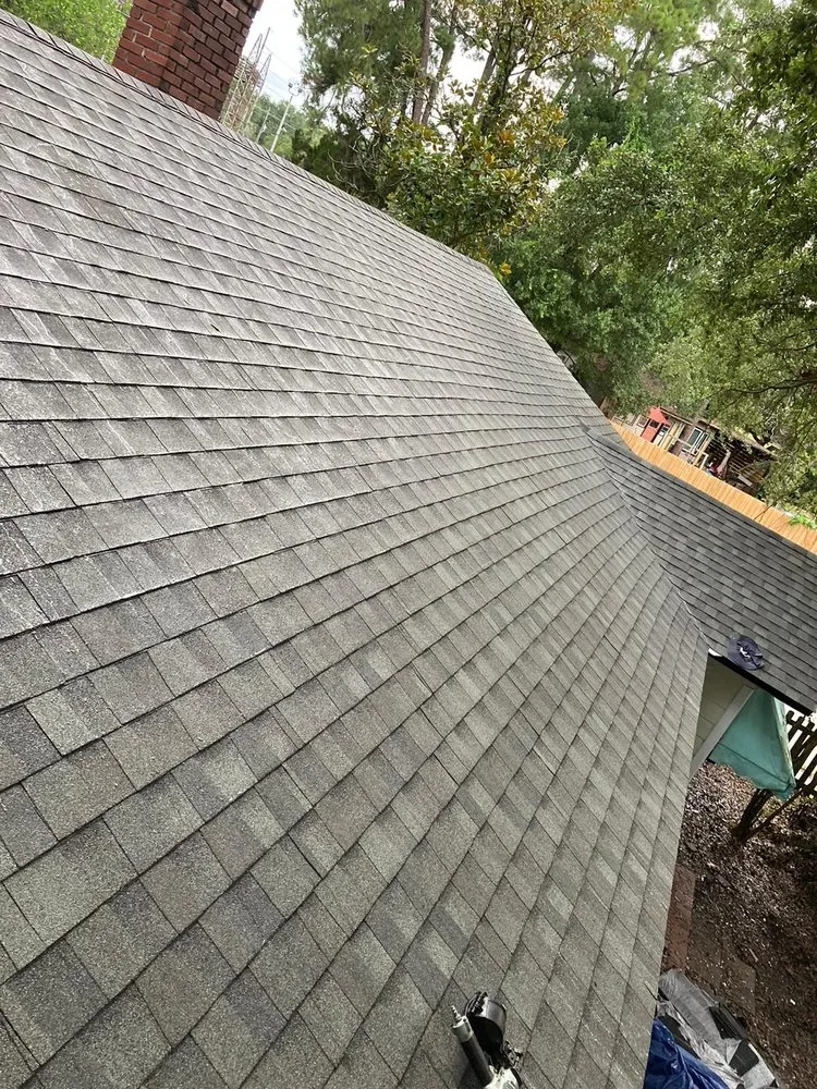 Slide of Payless Roofing