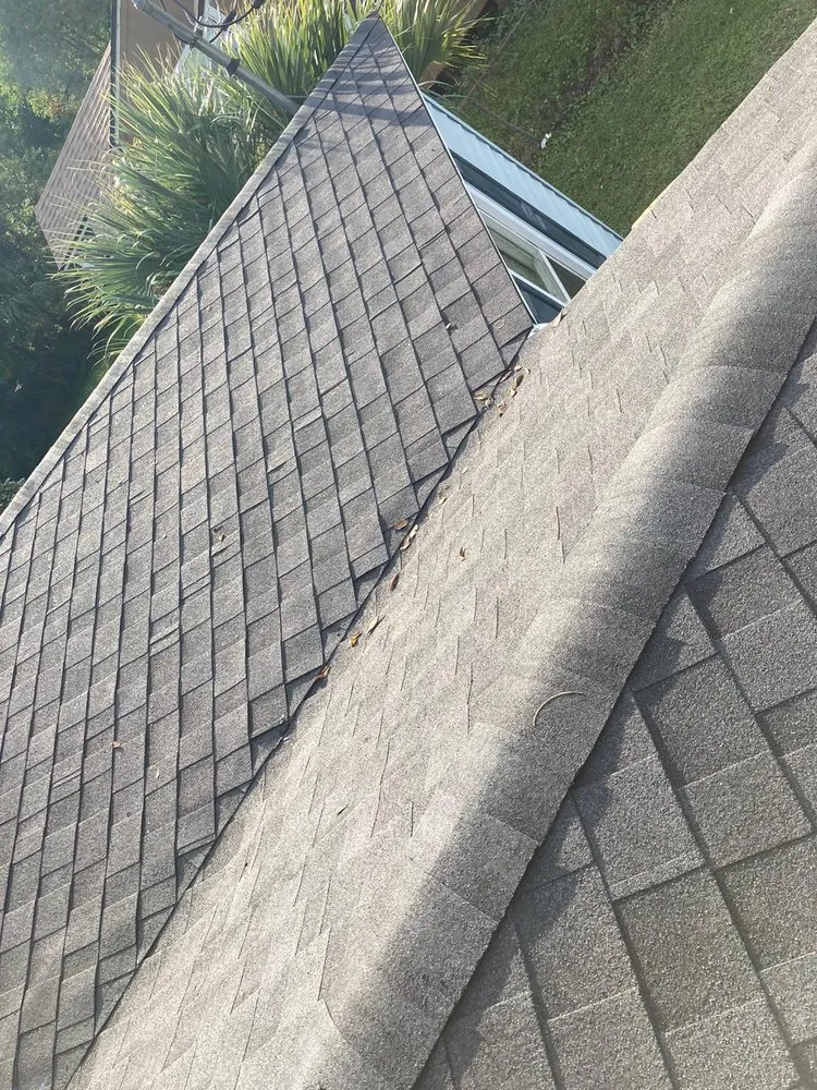 Slide of Payless Roofing