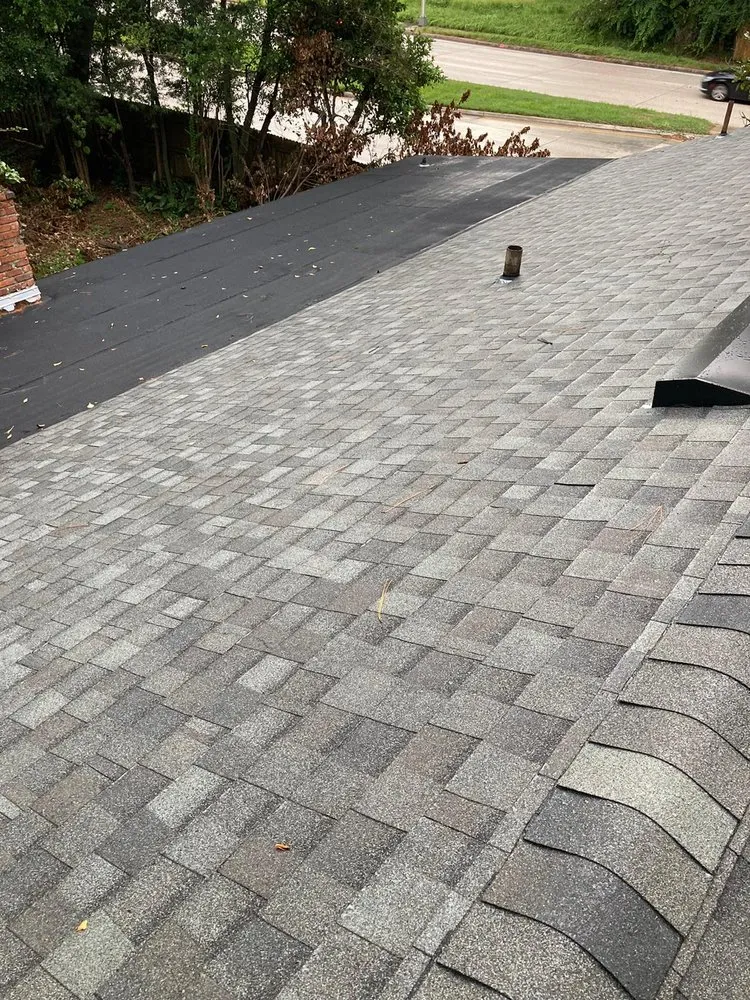 Slide of Payless Roofing