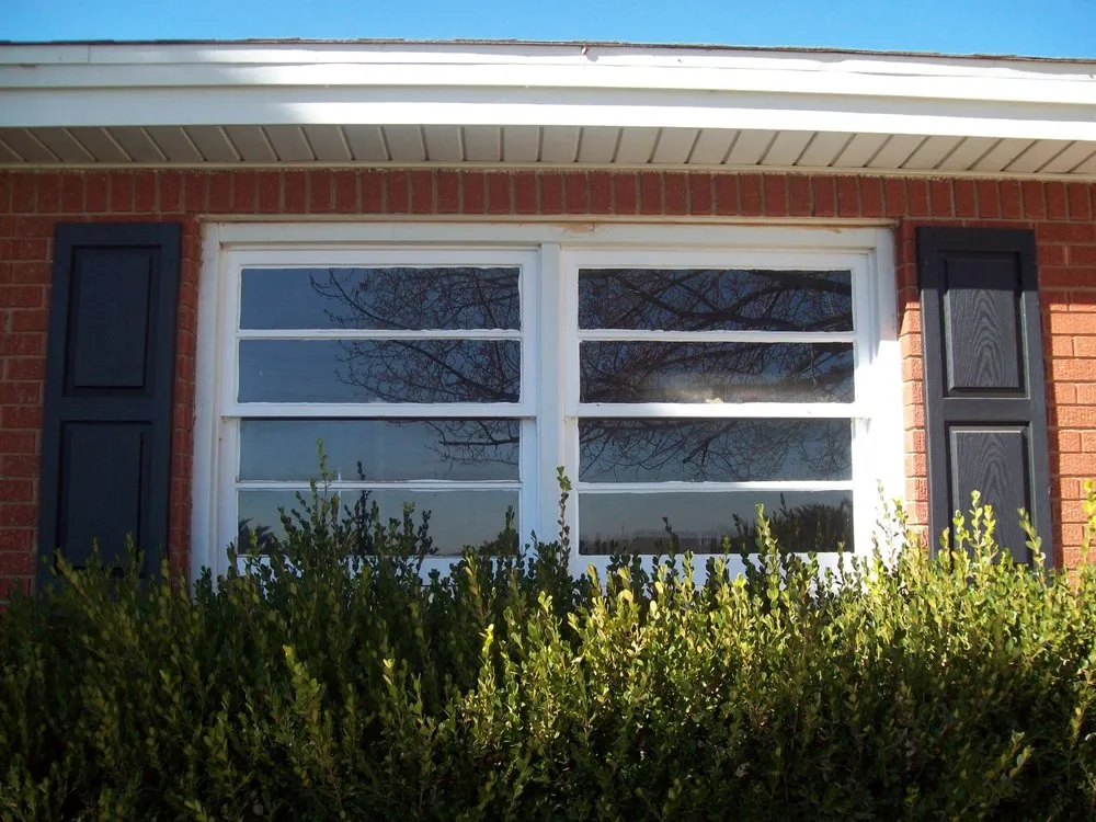 Slide of Payless Siding & Windows