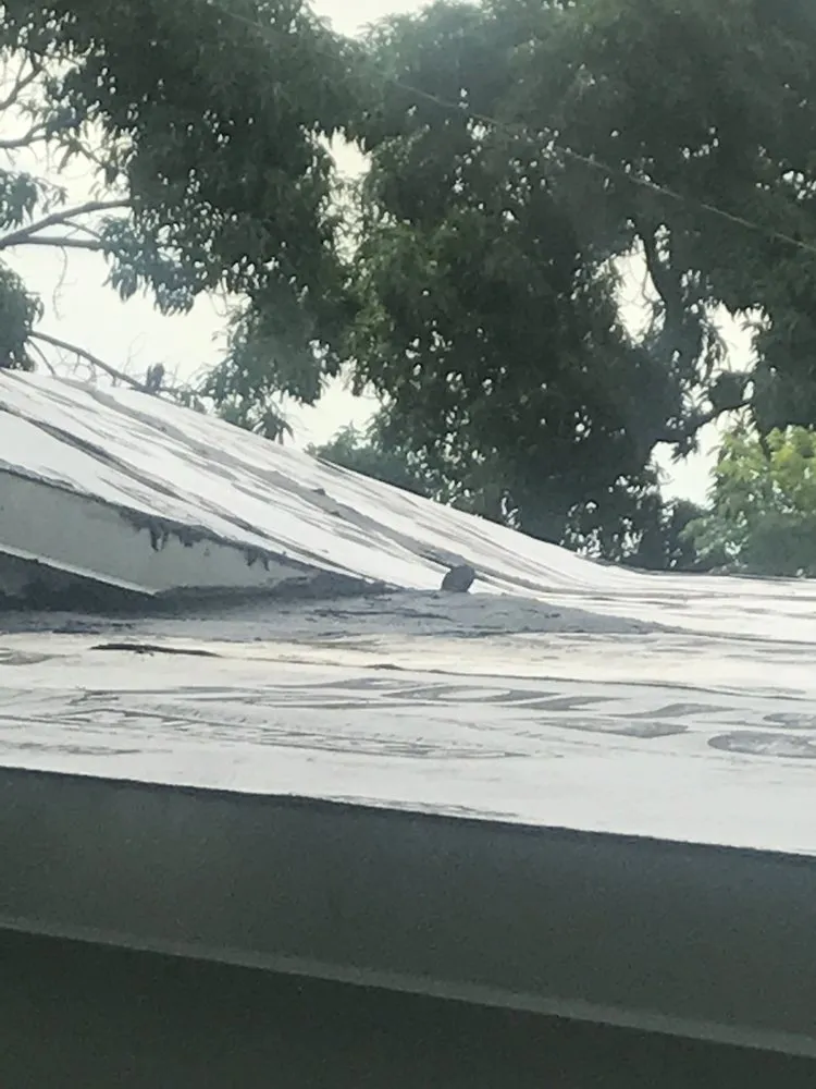 Slide of Payton Roofing