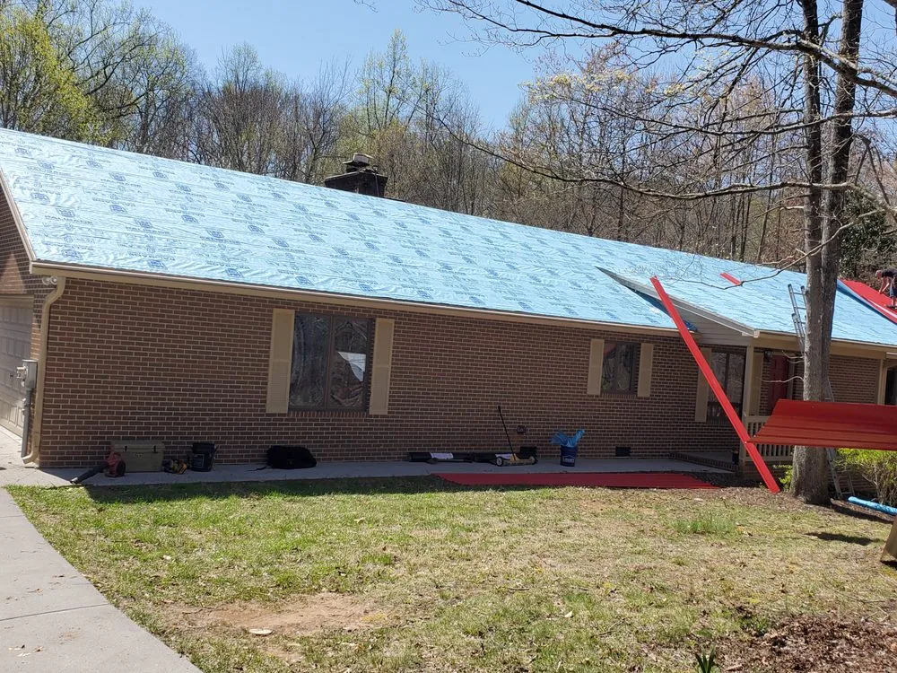 Slide of Peace Roofing