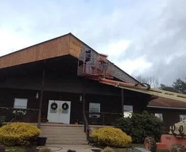 Slide of Peachey's Roofing