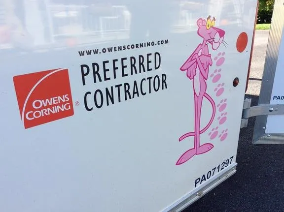 Slide of Peachey's Roofing