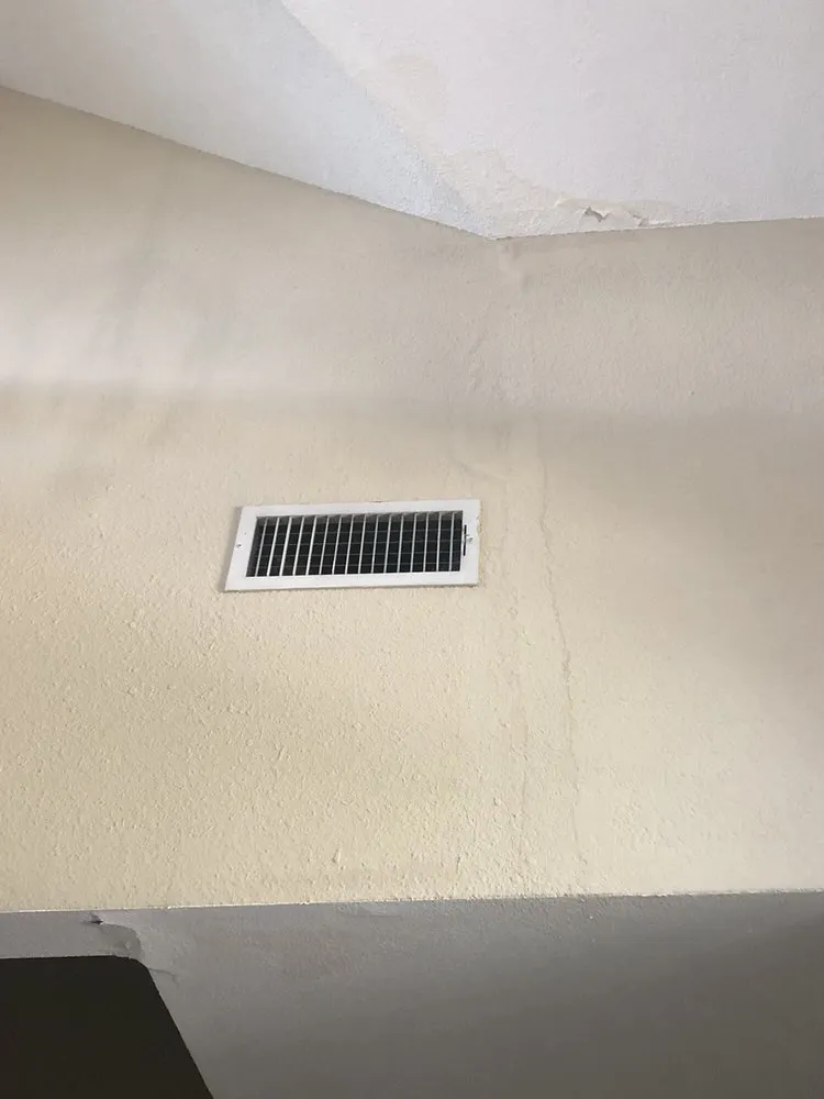 Slide of Peacock Roofing