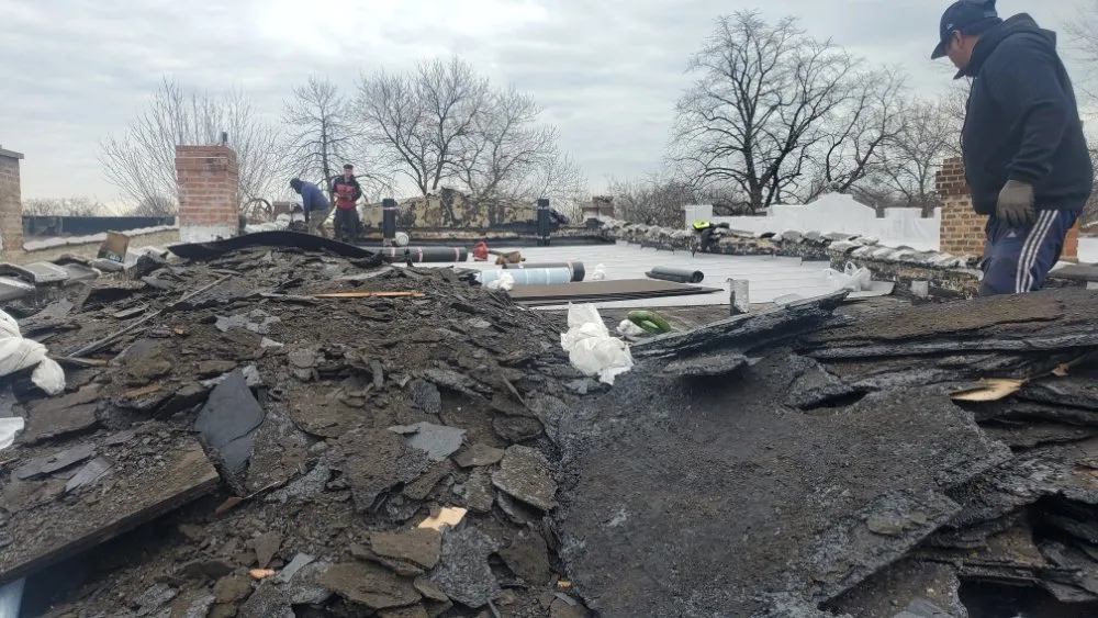 Slide of Peak and Point Roofing repair