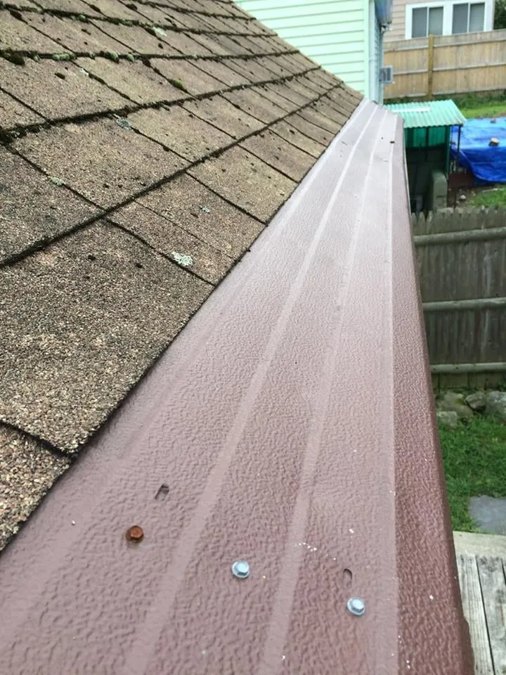 Slide of Peak Company Roofing