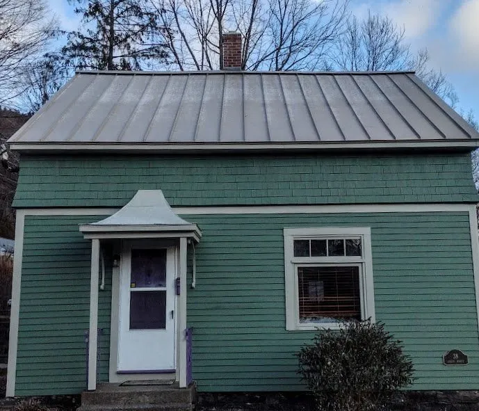 Slide of Peak Performance Roofing