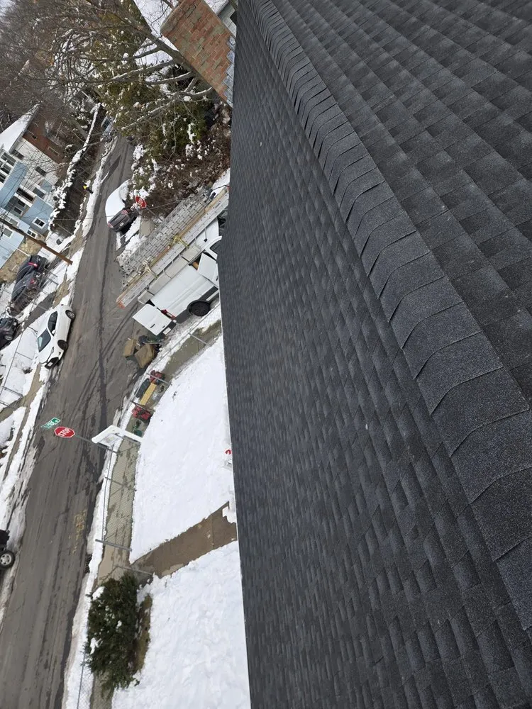 Slide of Peak Quality Roofing