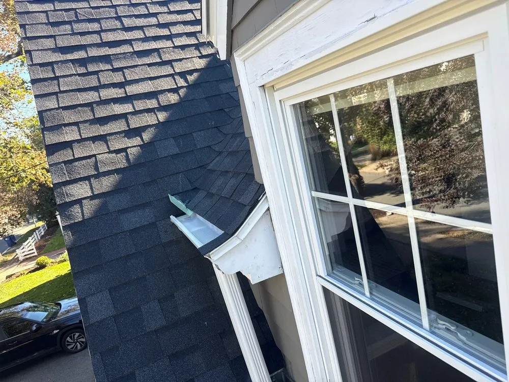 Slide of Peak Quality Roofing