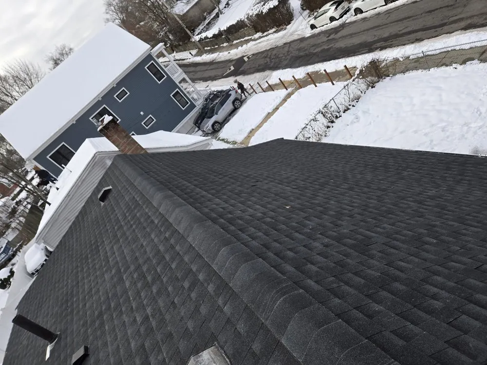 Slide of Peak Quality Roofing