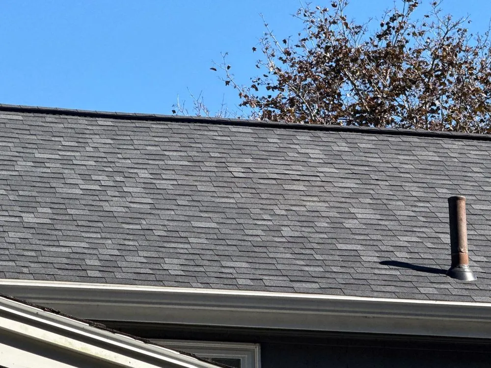 Slide of Peak Quality Roofing