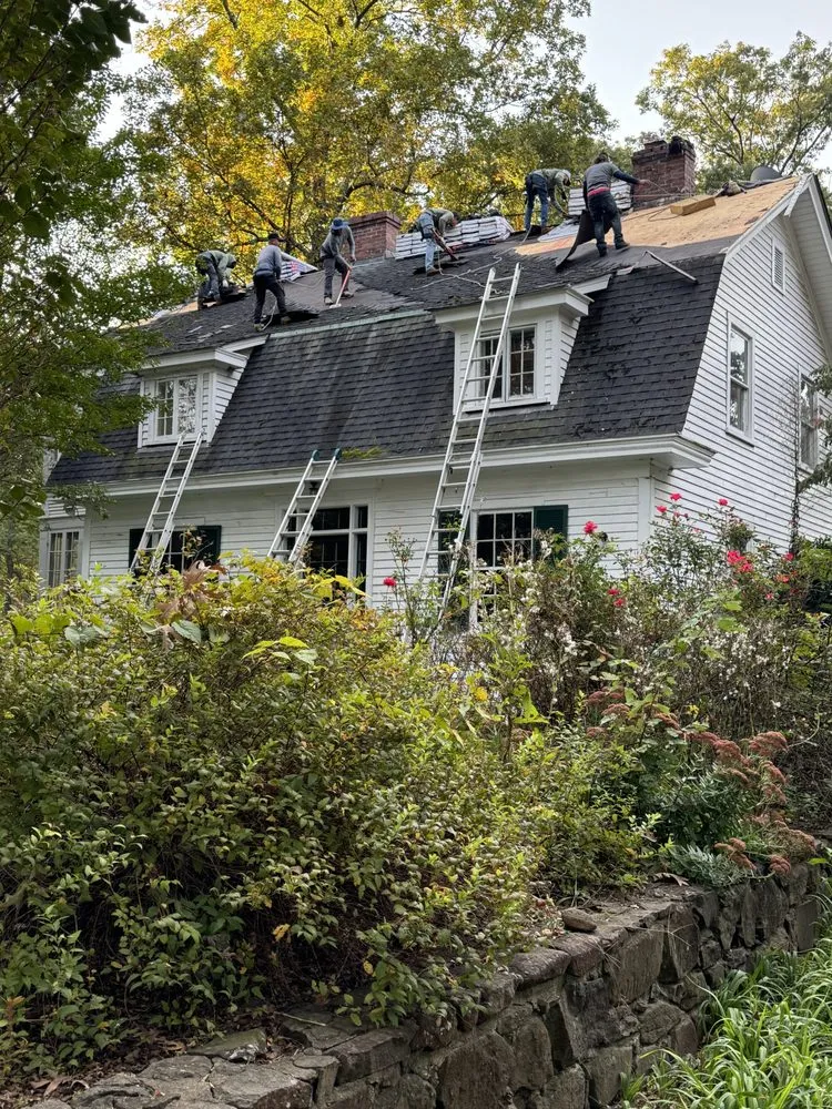 Slide of Peak Roofing Contractors