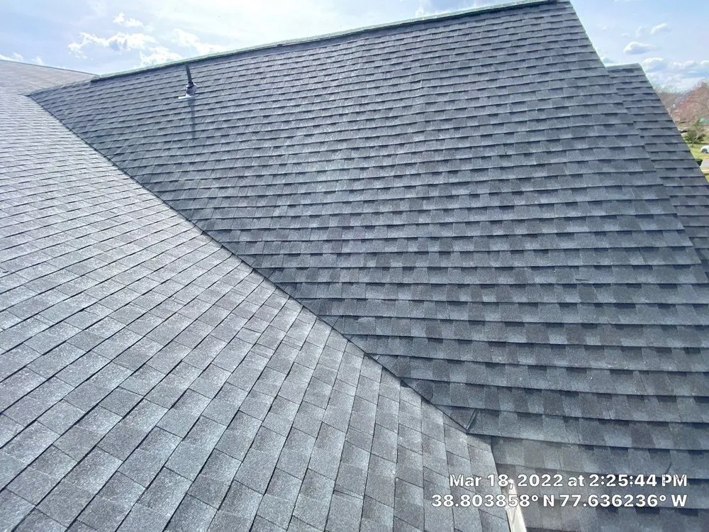 Slide of Peak Roofing Contractors